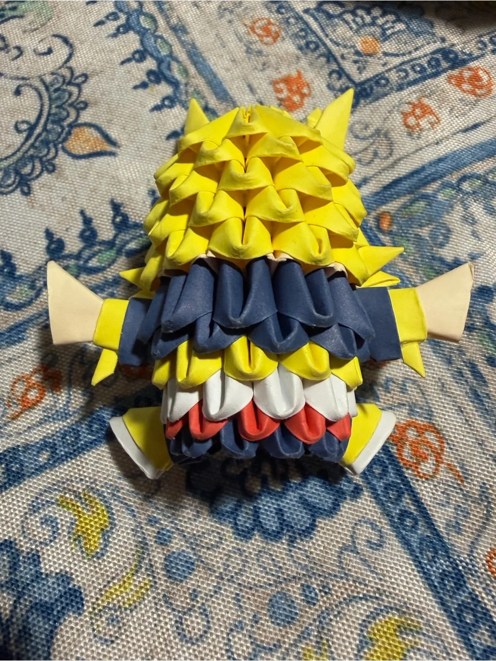 Preloved: 3D origami figure crafted using modular paper folding techniques.